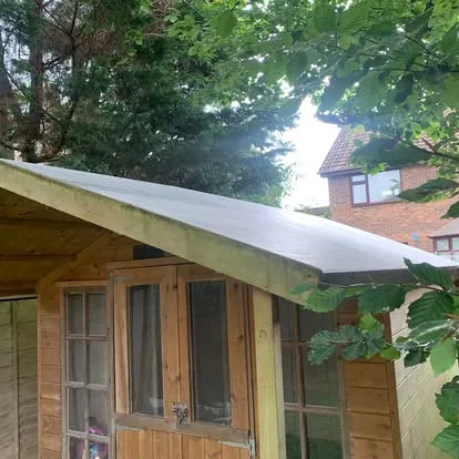 Summerhouse roof after a new continuous EPDM covering was fitted