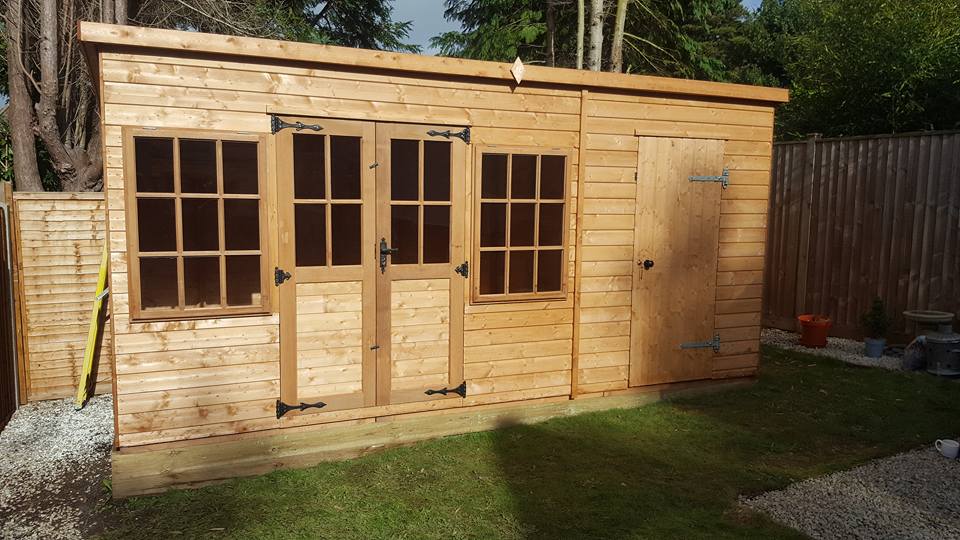 Completed shed repair in a customer garden