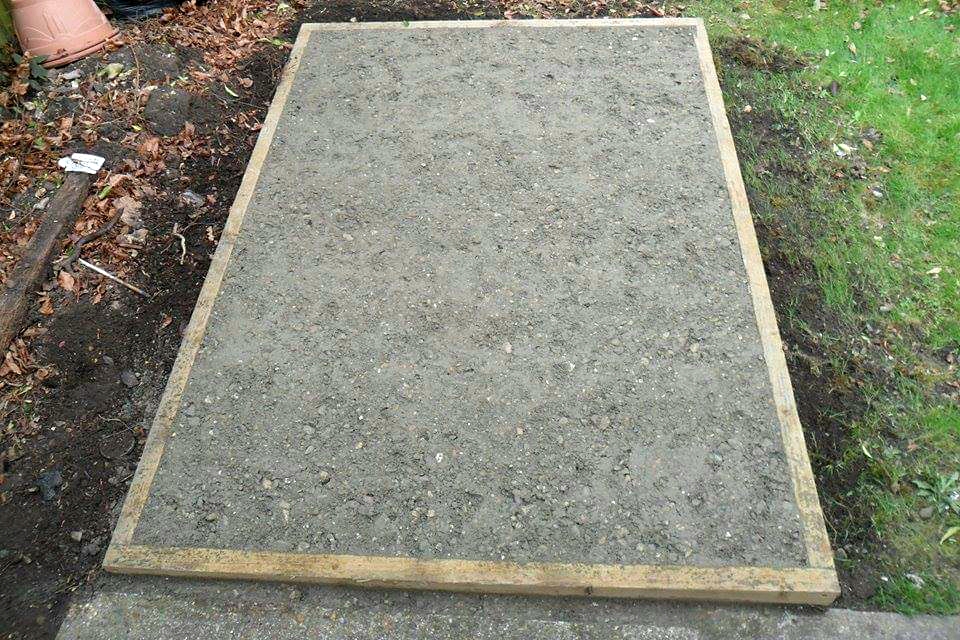 Prepared base ready for a relocated or replacement garden building