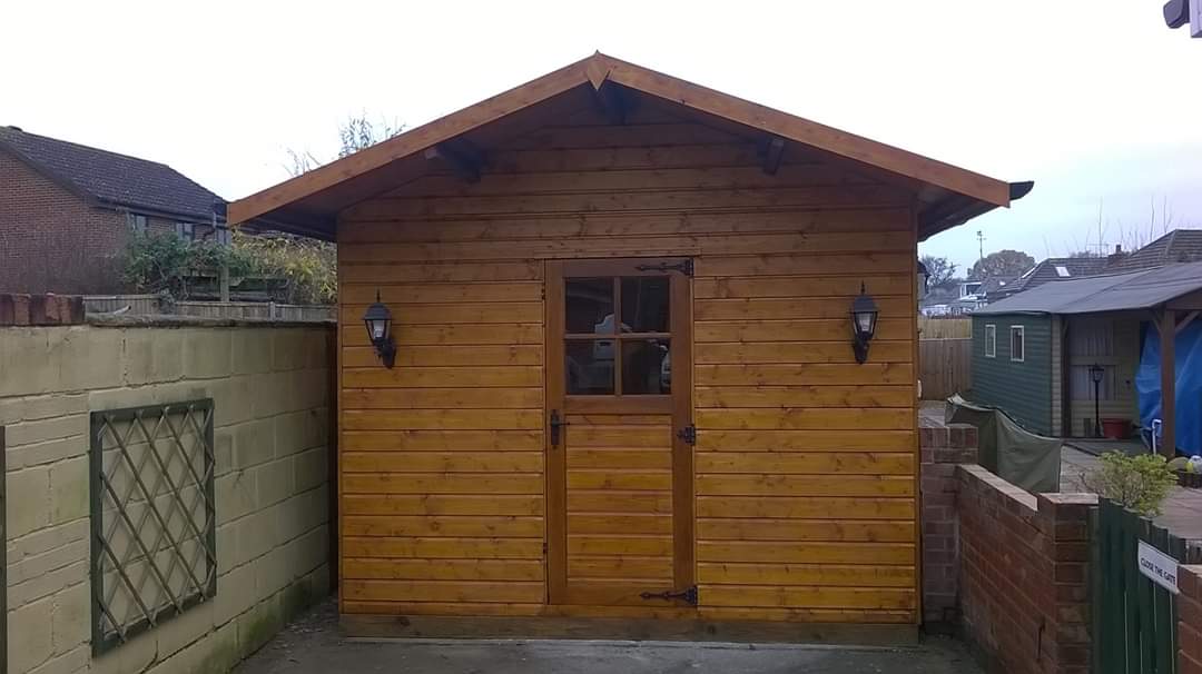 Repaired timber garden building